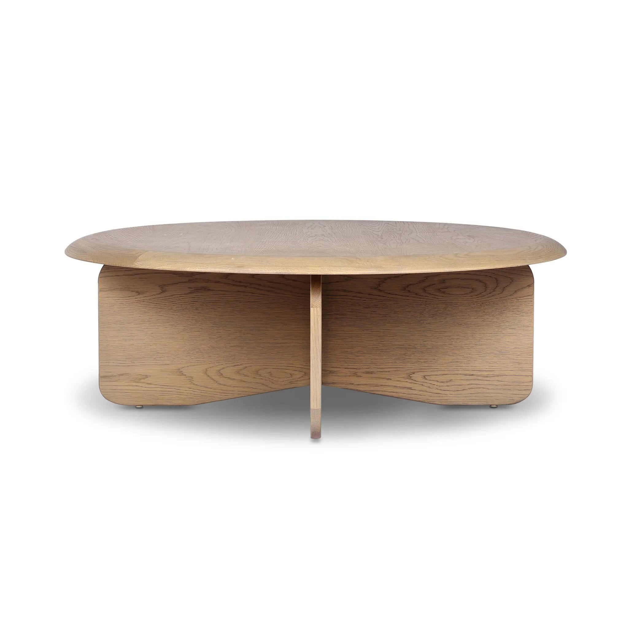 Featuring Surie Sandy Oak Resawn Coffee Table by Four Hands at Amethyst Home. A shape-driven piece inspired by clean Nordic design. Softened edges and a curved base craft a sense of flow, accentuated by cathedral grain oak with beautiful natural warmth. Overall Dimensions: 48.00"w x 48.00"d x 16.50"h. Amethyst Home provides interior design, new home construction design consulting, vintage area rugs, and lighting in the Winter Garden metro area.