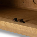 Worn oak sideboard with paneled doors, all atop an elevated stand. With natural cracks for character, this piece brings bonus storage and vintage charm to dining spaces Amethyst Home provides interior design, new home construction design consulting, vintage area rugs, and lighting in the Los Angeles metro area.