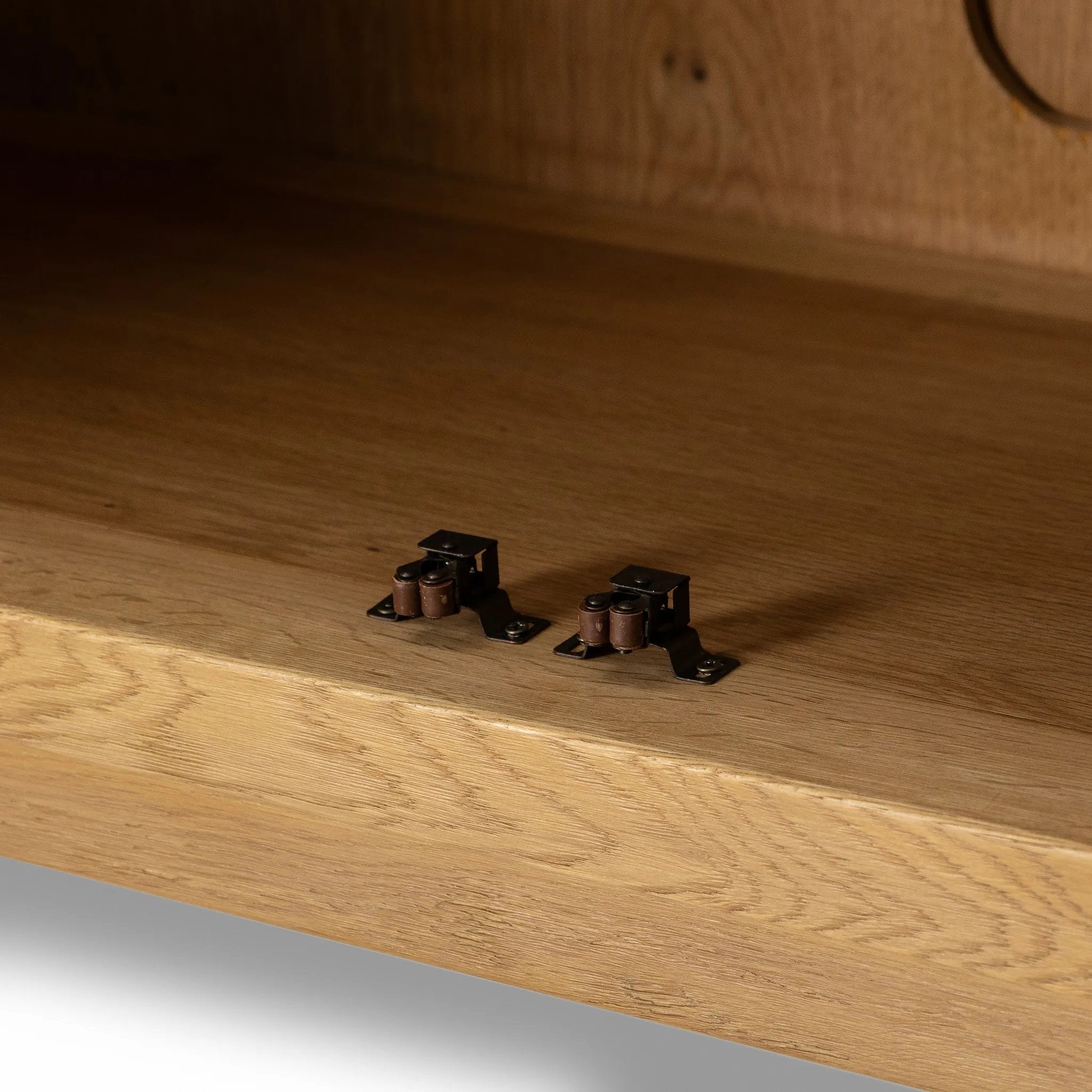 Worn oak sideboard with paneled doors, all atop an elevated stand. With natural cracks for character, this piece brings bonus storage and vintage charm to dining spaces Amethyst Home provides interior design, new home construction design consulting, vintage area rugs, and lighting in the Los Angeles metro area.