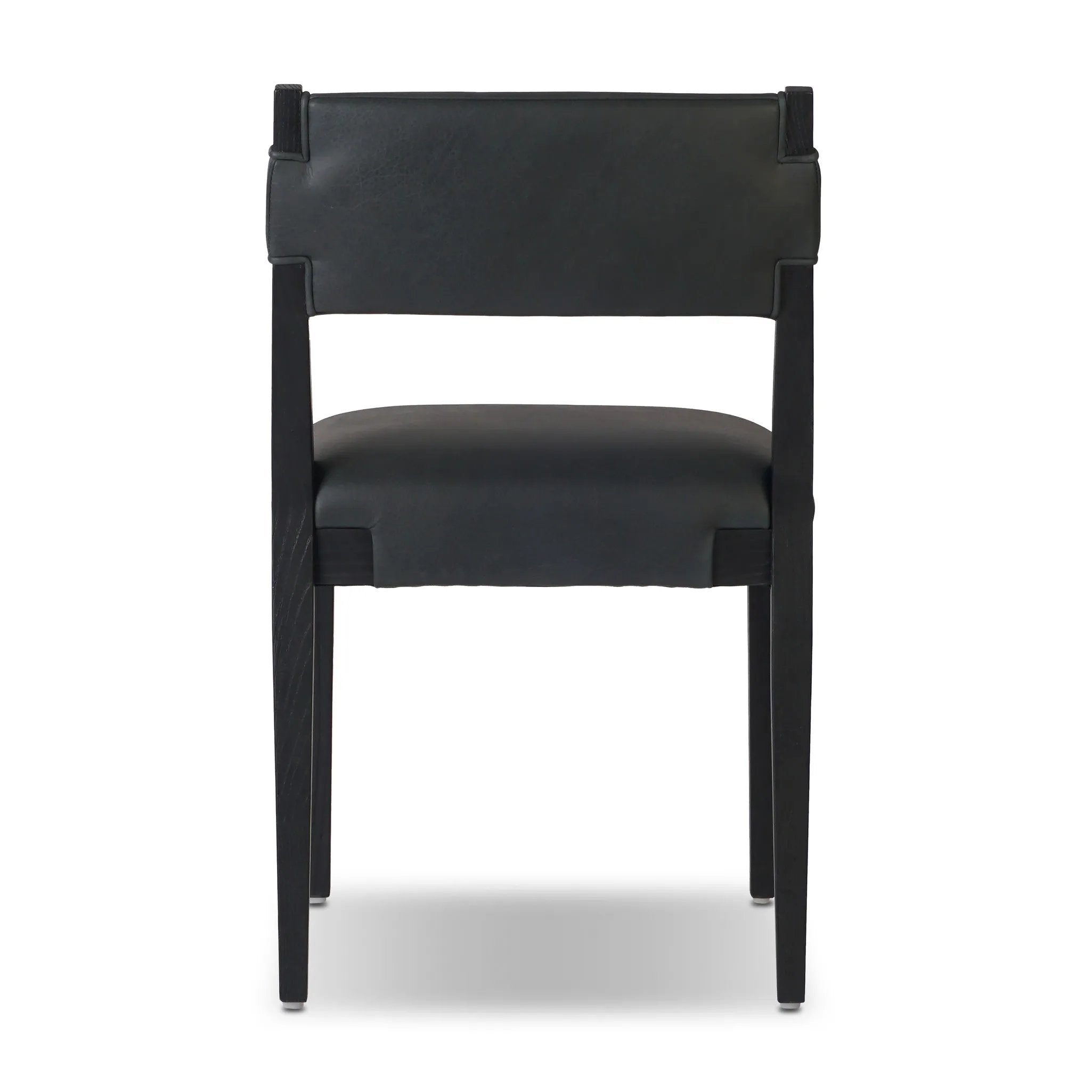 Featuring Tamari Brickhouse Black Dining Chair by Four Hands at Amethyst Home. Indulge in the luxurious experience of dining with our Tamari Brickhouse Black Dining Chair. With its sleek and sophisticated design, this chair is sure to elevate any dining space. Comfortable and elegant, it's the perfect addition to your upscale lifestyle.
Overall Dimensions:. Amethyst Home provides interior design, new home construction design consulting, vintage area rugs, and lighting in the Des Moines metro area.