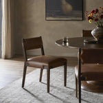 Featuring Tamari Sonoma Chestnut Dining Chair by Four Hands at Amethyst Home. Upgrade your dining experience with the Tamari Sonoma Chestnut Dining Chair. Made with high-quality materials, this chair provides comfortable seating while adding a touch of elegance to your dining room. Its sleek design and sturdy construction make it the perfect addition to any. Amethyst Home provides interior design, new home construction design consulting, vintage area rugs, and lighting in the San Diego metro area.
