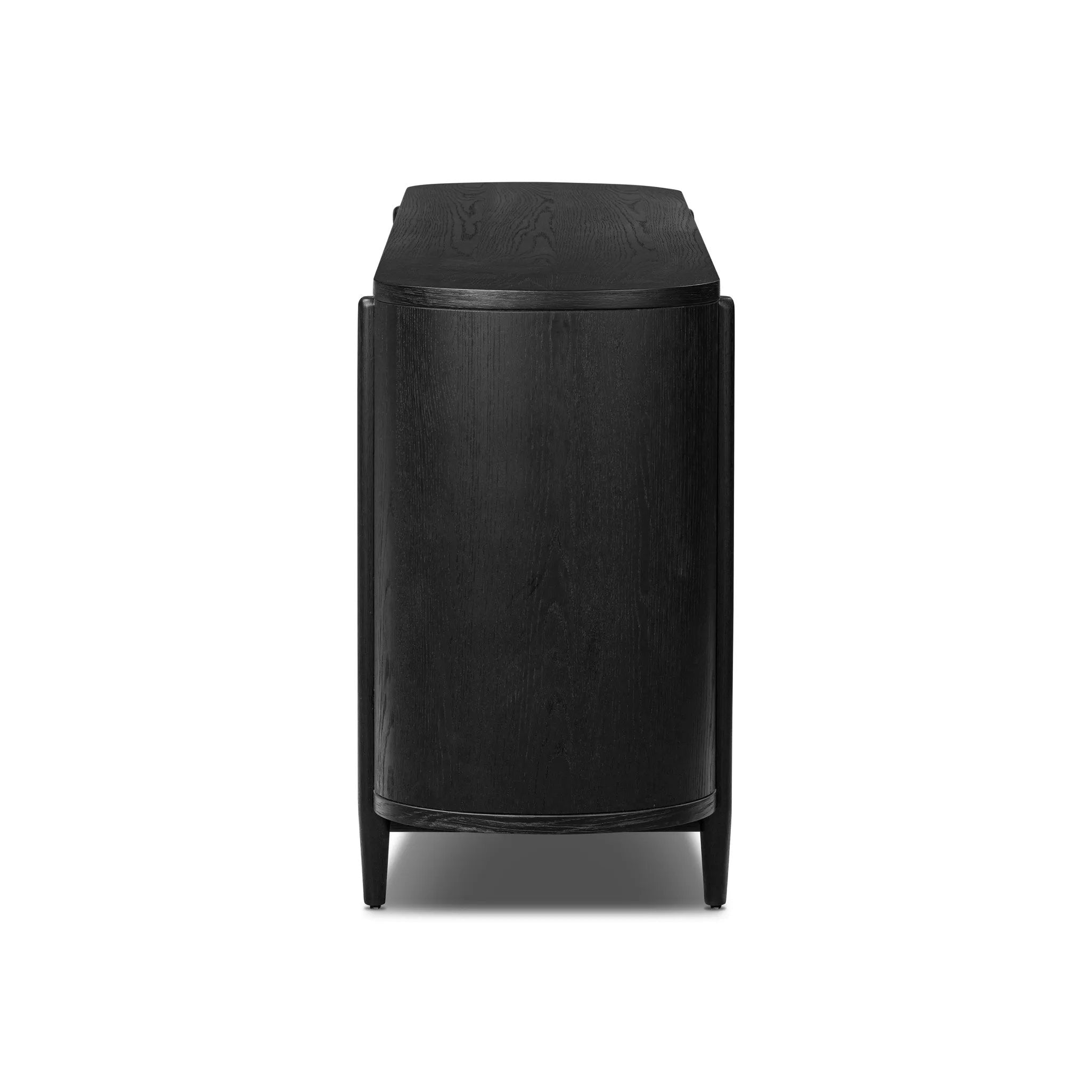 Infuse your collection with timeless midcentury design. Crafted from oak and parawood, a six-drawer dresser is finished in a matte black, with simple brass hardware Amethyst Home provides interior design, new home construction design consulting, vintage area rugs, and lighting in the Omaha metro area.