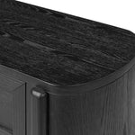 Infuse your collection with timeless midcentury design. Crafted from oak and parawood, a two-drawer nightstand is finished in a matte black, with simple brass hardware Amethyst Home provides interior design, new home construction design consulting, vintage area rugs, and lighting in the Charlotte metro area.