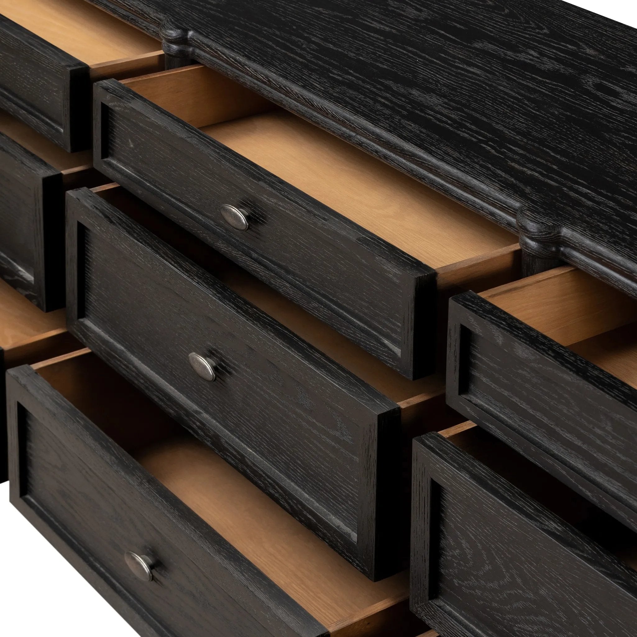 Made from distressed black-finished oak with slim legs, nine drawers bring antique European vibes to modern bedroom styling. This item has been modified to comply with the STURDY Act. See a full list of modified products and data changes in the “STURDY Act” file in the Downloads section below Amethyst Home provides interior design, new home construction design consulting, vintage area rugs, and lighting in the Tampa metro area.