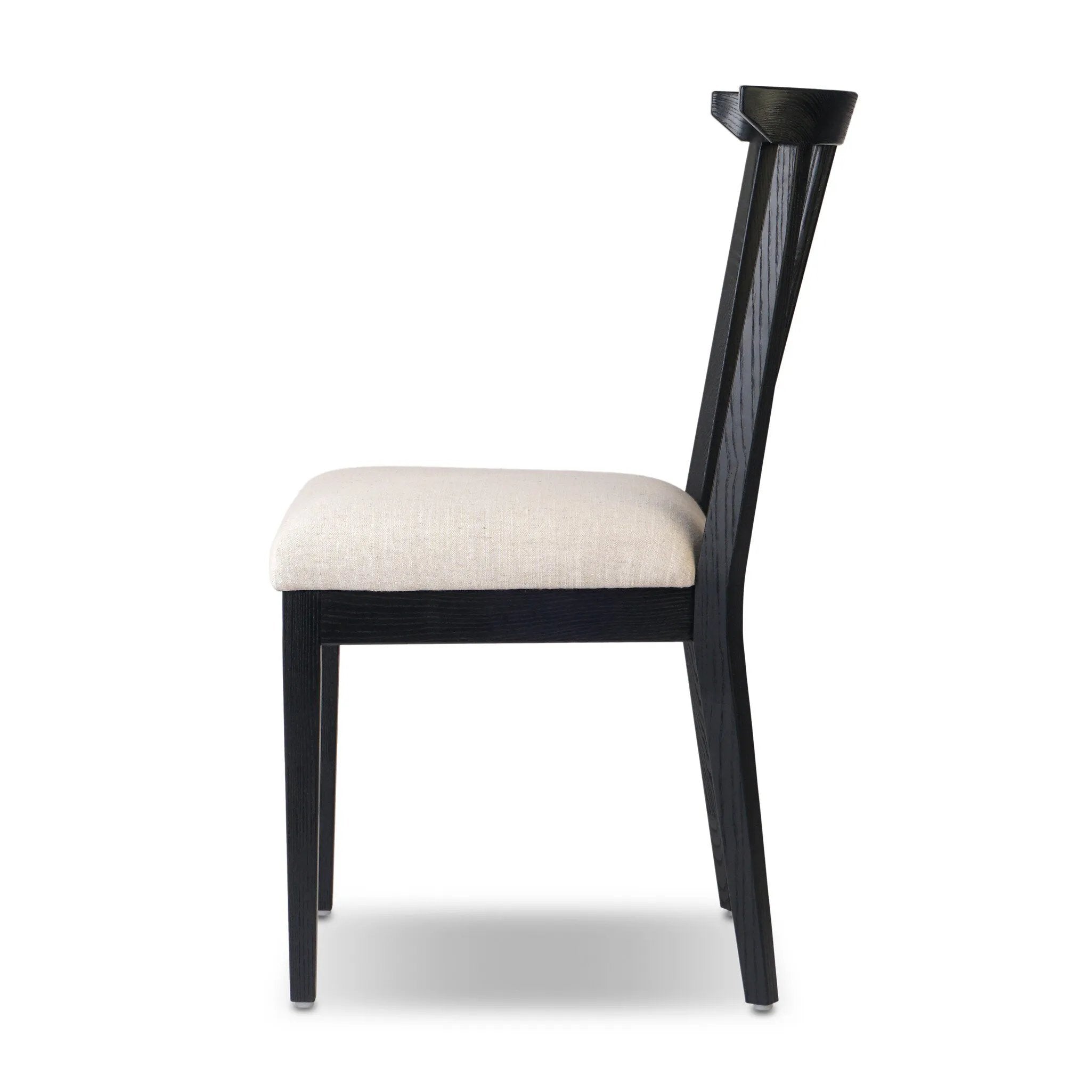 A linear dining style inspired by Japanese tea houses, crafted from black-finished ash. Designed for comfort, a thick cushion seat is upholstered in a casual poly-linen blend Amethyst Home provides interior design, new home construction design consulting, vintage area rugs, and lighting in the Boston metro area.