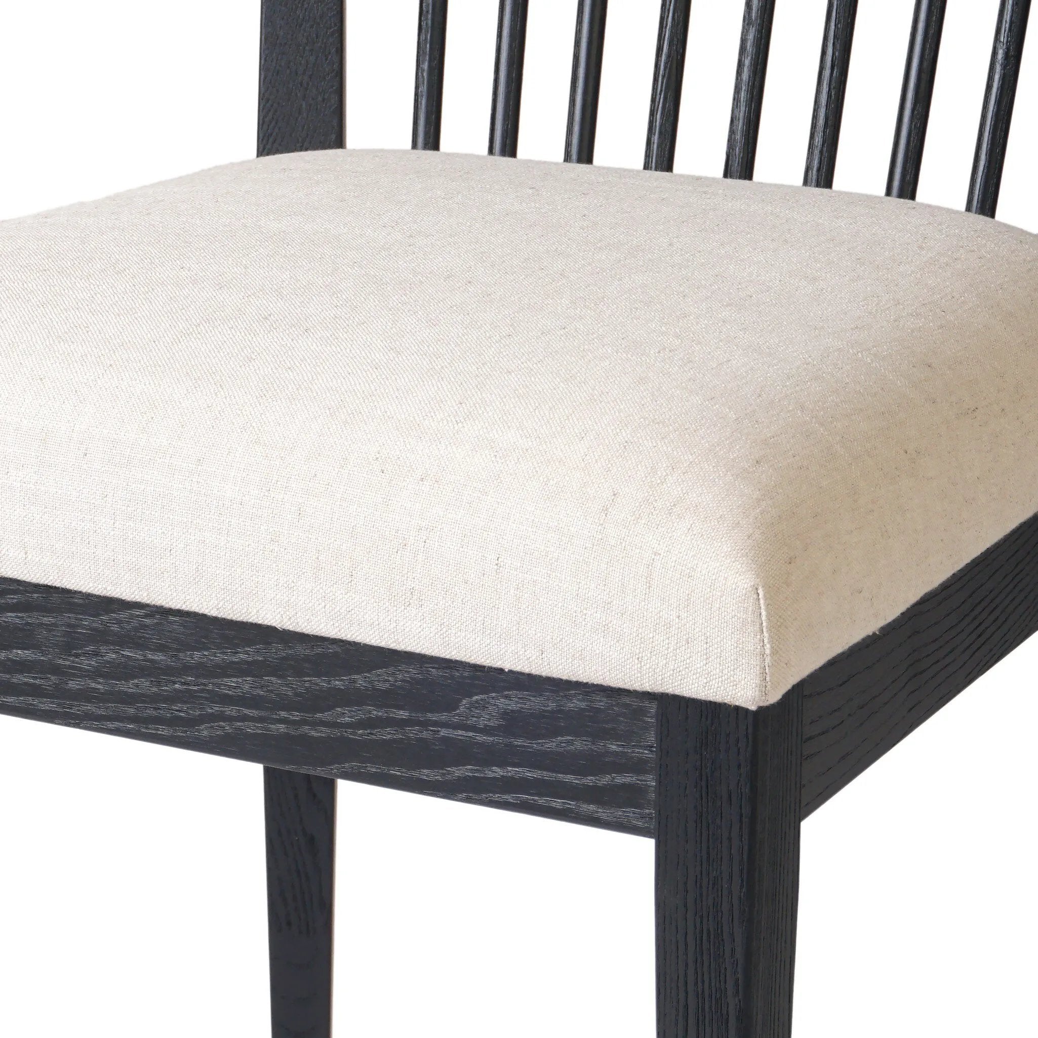 A linear dining style inspired by Japanese tea houses, crafted from black-finished ash. Designed for comfort, a thick cushion seat is upholstered in a casual poly-linen blend Amethyst Home provides interior design, new home construction design consulting, vintage area rugs, and lighting in the Portland metro area.