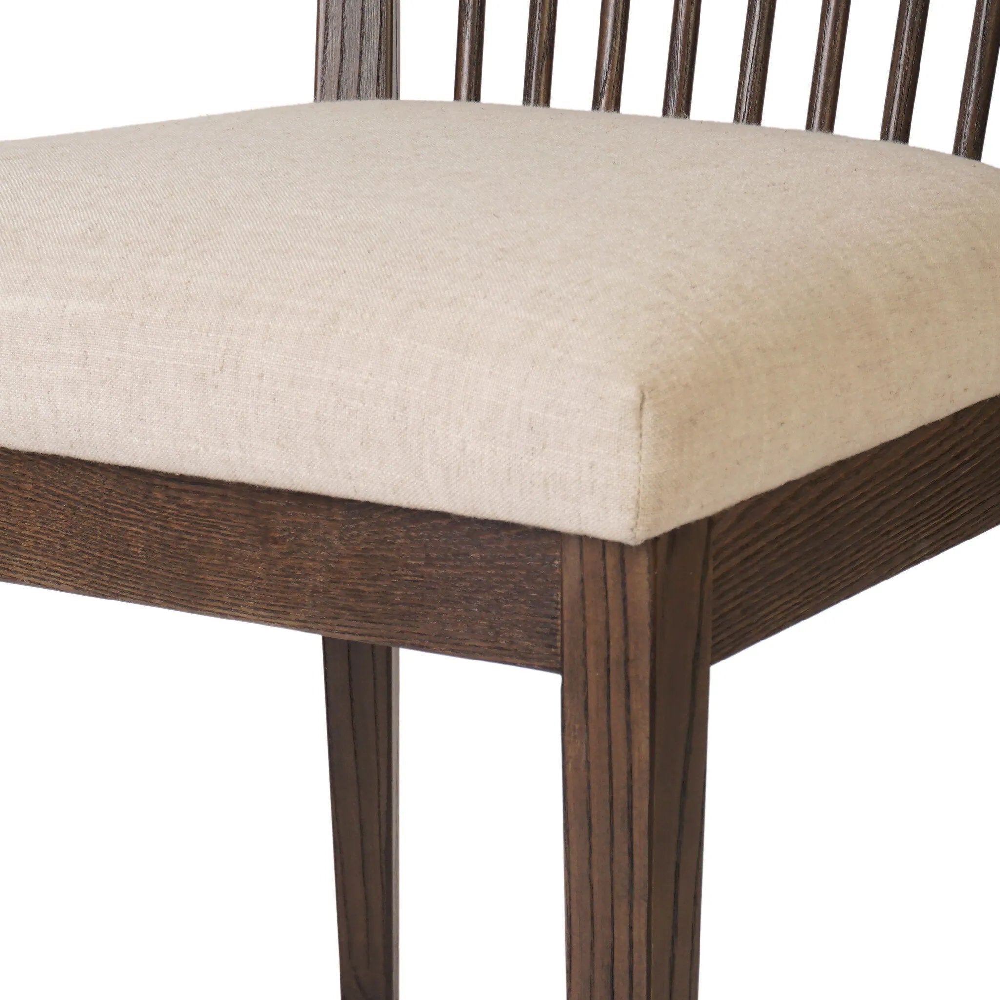 A linear dining style inspired by Japanese tea houses, crafted from natural ash. Designed for comfort, a thick cushion seat is upholstered in a casual poly-linen blend Amethyst Home provides interior design, new home construction design consulting, vintage area rugs, and lighting in the Dallas metro area.