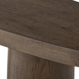 Featuring Valen Rustic Brown Oak Veneer Console Table by Four Hands at Amethyst Home. Made from rustic brown oak, an open-style console table is streamlined while not short on presence, with its exaggerated cylinder legs and polished pill-shaped top.Overall Dimensions: 78.00"w x 18.00"d x 32.00"hWeight : 99.21 lbsMaterials: Oak Veneer, Oak Plywood. Amethyst Home provides interior design, new home construction design consulting, vintage area rugs, and lighting in the Scottsdale metro area.