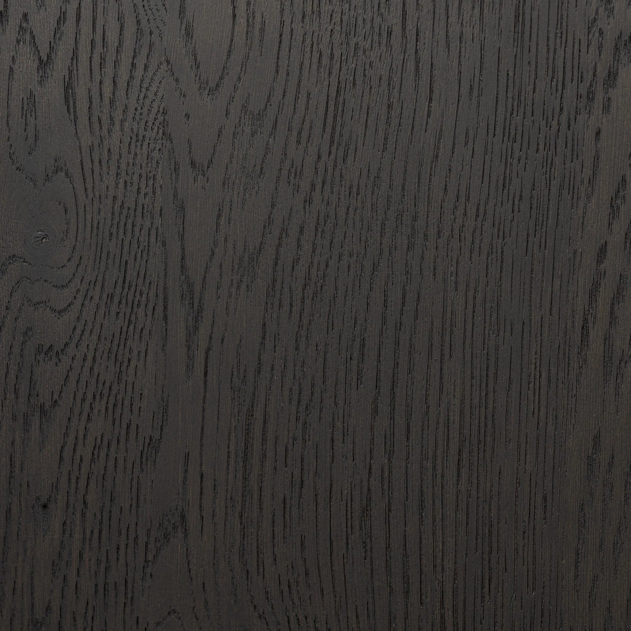 Lacquered cabinets make for evocative storage with their everlasting glossy finish. Great for small spaces, this sideboard with interior shelves features worn black oak doors for balance and contrast Amethyst Home provides interior design, new home construction design consulting, vintage area rugs, and lighting in the Park City metro area.