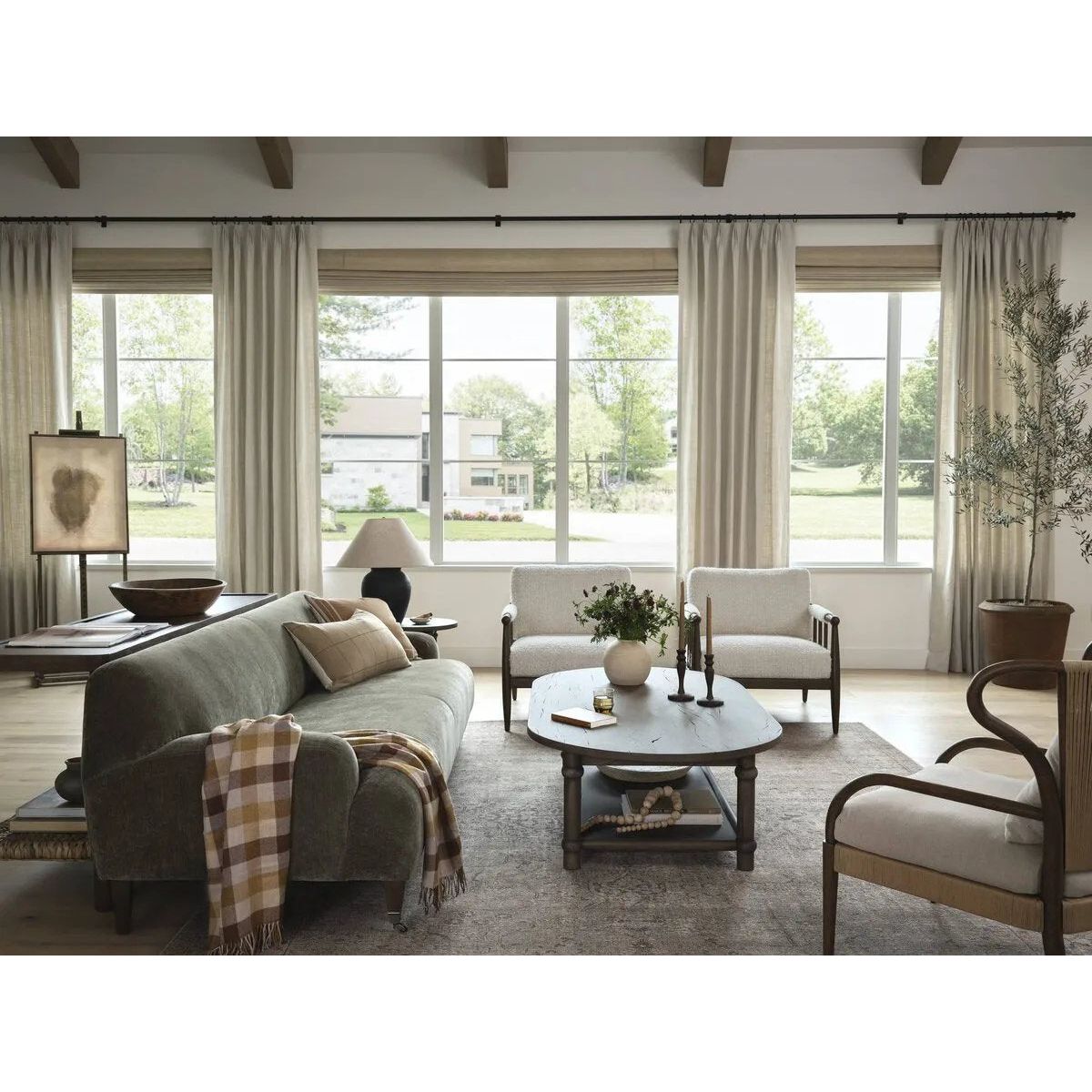 Featuring Warren Ivan Snow Chair by Four Hands at Amethyst Home. A classic silhouette through a contemporary lens. Framed in vintage oak, this accent chair features tapered legs, spindles along the arms and bauble details. Finished in Turkish-made upholstery with a heavy pile that blends brushed, pulled and boucle styles, it's woven into a subtle linear pat. Amethyst Home provides interior design, new home construction design consulting, vintage area rugs, and lighting in the Charlotte metro area.