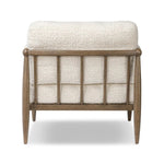 Featuring Warren Ivan Snow Chair by Four Hands at Amethyst Home. A classic silhouette through a contemporary lens. Framed in vintage oak, this accent chair features tapered legs, spindles along the arms and bauble details. Finished in Turkish-made upholstery with a heavy pile that blends brushed, pulled and boucle styles, it's woven into a subtle linear pat. Amethyst Home provides interior design, new home construction design consulting, vintage area rugs, and lighting in the Park City metro area.