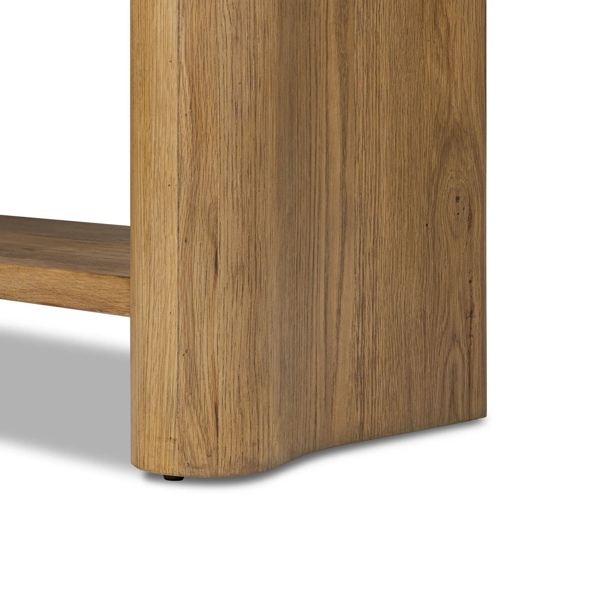 Thick, curvy and rounded sides give this bookcase its playful character inspired by soft Brutalism. Made from light, solid oak, substantial shelving provides generous space for books, photos and keepsakes Amethyst Home provides interior design, new home construction design consulting, vintage area rugs, and lighting in the Kansas City metro area.