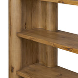 Thick, curvy and rounded sides give this bookcase its playful character inspired by soft Brutalism. Made from light, solid oak, substantial shelving provides generous space for books, photos and keepsakes Amethyst Home provides interior design, new home construction design consulting, vintage area rugs, and lighting in the Laguna Beach metro area.