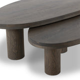 Made from solid natural oak, turned pillar-style legs complement organically shaped tabletops, perfectly sized for nesting. Option to buy tables individually or together as a two-piece set Amethyst Home provides interior design, new home construction design consulting, vintage area rugs, and lighting in the Des Moines metro area.