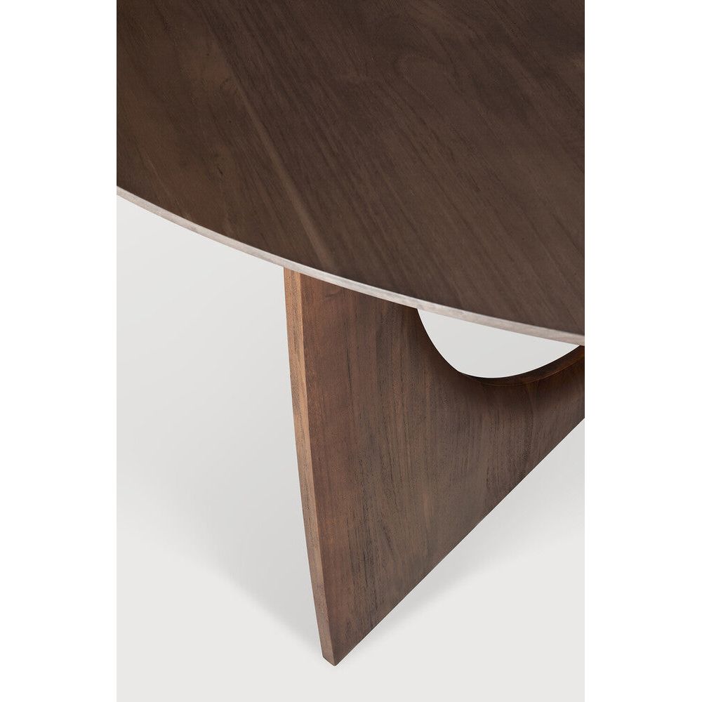 Featuring Geometric Teak Brown Round Dining Table by Ethnicraft at Amethyst Home. In the Geometric collection, shapes intersect in unexpected ways, creating playful contrasts with light and shadow at every angle. Inspired by the bestselling side table, the round Geometric dining table makes a practical statement.Weight : 176 lbDimensions:  64.5 in W x 64.5 in L x  14.5 in HAdjustable. Amethyst Home provides interior design, new construction, custom furniture, and area rugs in the Boston metro area