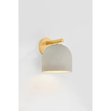 Inspired by Neoclassical architecture, Cara uses a domed shade and textural ceramic finish for a sconce that feels both ancient and new. A matte reactive glaze in an creamy hue creates a subtle surface grain that imitates natural stone. A circular modern armback in an Aged Brass finish adds shine to the fixture. Amethyst Home provides interior design, new home construction design consulting, vintage area rugs, and lighting in the Los Angeles metro area.