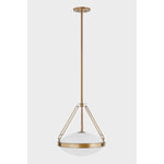 The Kade pendant updates a nostalgic shape with sleek, industrial metalwork and two large opal matte glass shades. Inspired by vintage elements, it features a striking suspension technique with three oversized loops connecting to the central housing above the fixture. The Patina Brass finish adds old-world finesse to the frame. Amethyst Home provides interior design, new home construction design consulting, vintage area rugs, and lighting in the Seattle metro area.