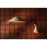 Drawing inspiration from the relaxed style of coastal villages, the Pawley family is carefree yet intentional. The pendant features graceful metalwork with a Historic Bronze finish, including a charming loop below the Soft Sand shade. With an adjustable swivel head, the sconce lets you direct light exactly where needed. Amethyst Home provides interior design, new home construction design consulting, vintage area rugs, and lighting in the Kansas City metro area.