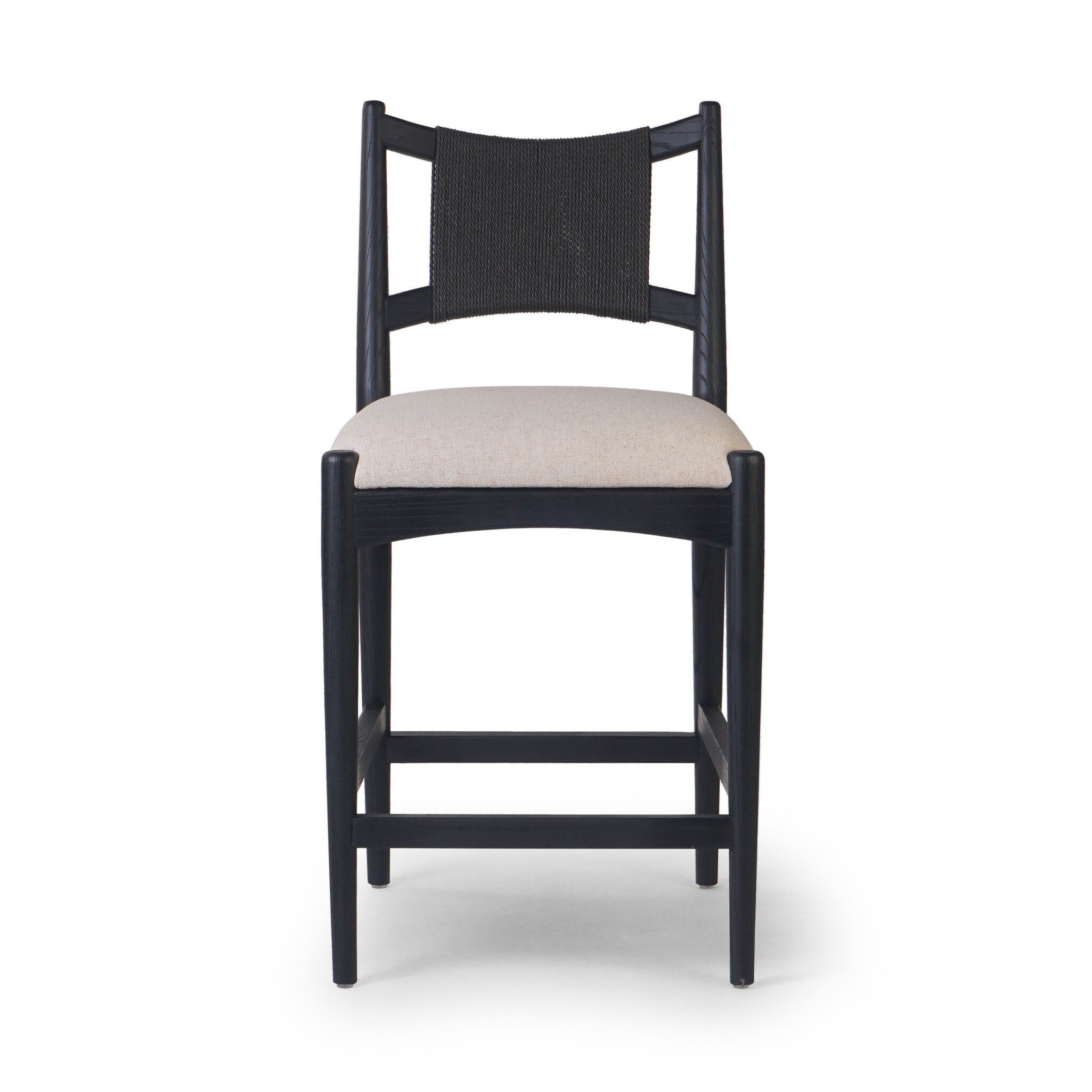 Featuring Haddon Antwerp Natural Counter Stool by Four Hands at Amethyst Home. A curved back wrapped and textural woven paper cord take this everyday counter stool to new heights. Black-finished parawood frames a linen-blend seat for a clean look with contrast.Overall Dimensions: 19.75"w x 23.25"d x 39.25"hWeight : 19.51 lbsMaterials : 39% Linen, 35% Cotton, 26% Polyester, Solid . Amethyst Home provides interior design, new construction, custom furniture, and area rugs in the Alpharetta metro area