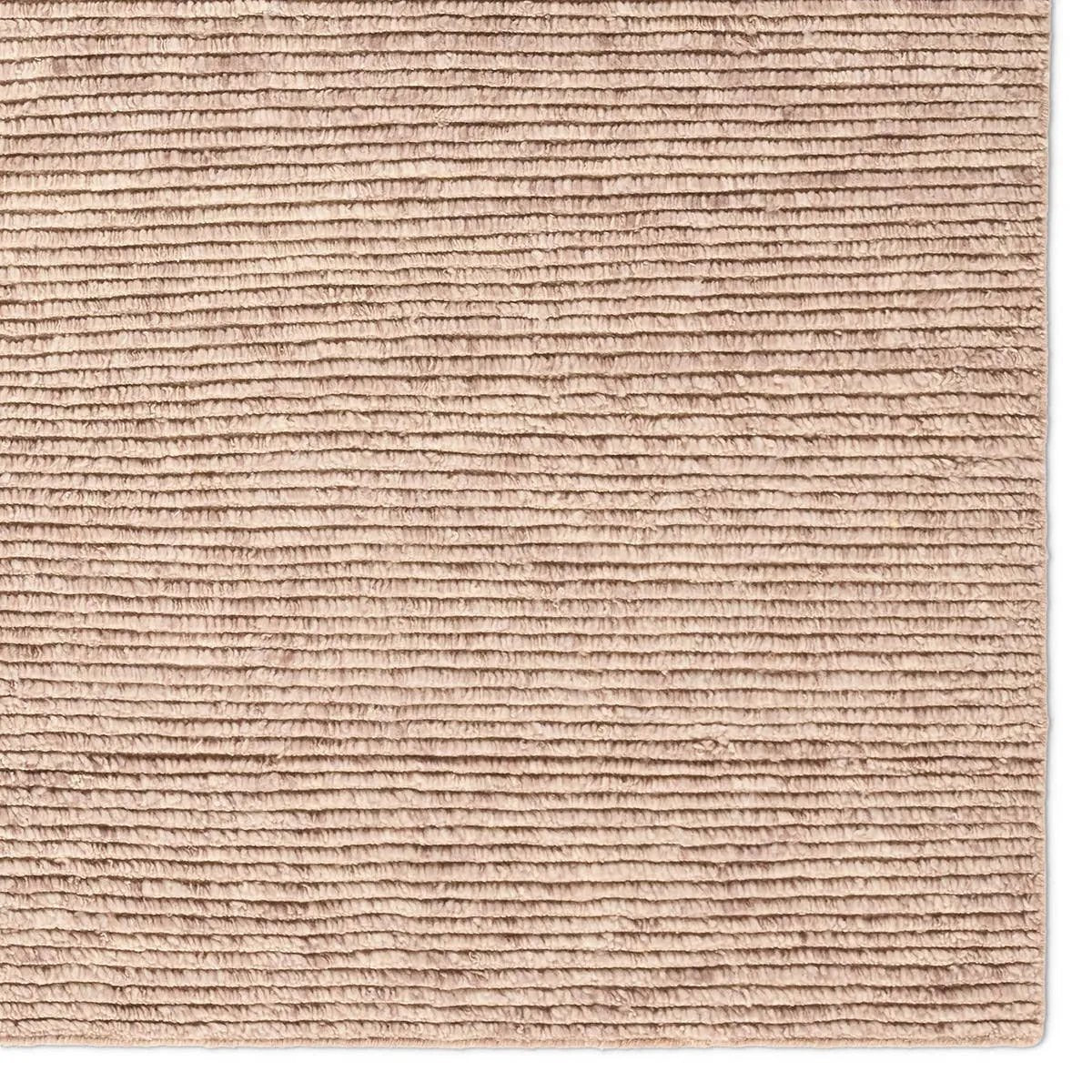 Featuring Alpine Hand-Knotted Rug by Jaipur Living at Amethyst Home. Drawing inspiration from Moroccan textiles, Alpine showcases the beauty in simplicity. Durable wool is hand-knotted onto a cotton foundation to create this high-piled accent piece. Its solid beige design instantly adds warmth and comfort to any indoor, medium-traffic setting.Hand Knotted100% . Amethyst Home provides interior design, new home construction design consulting, vintage area rugs, and lighting in the Dallas metro area.