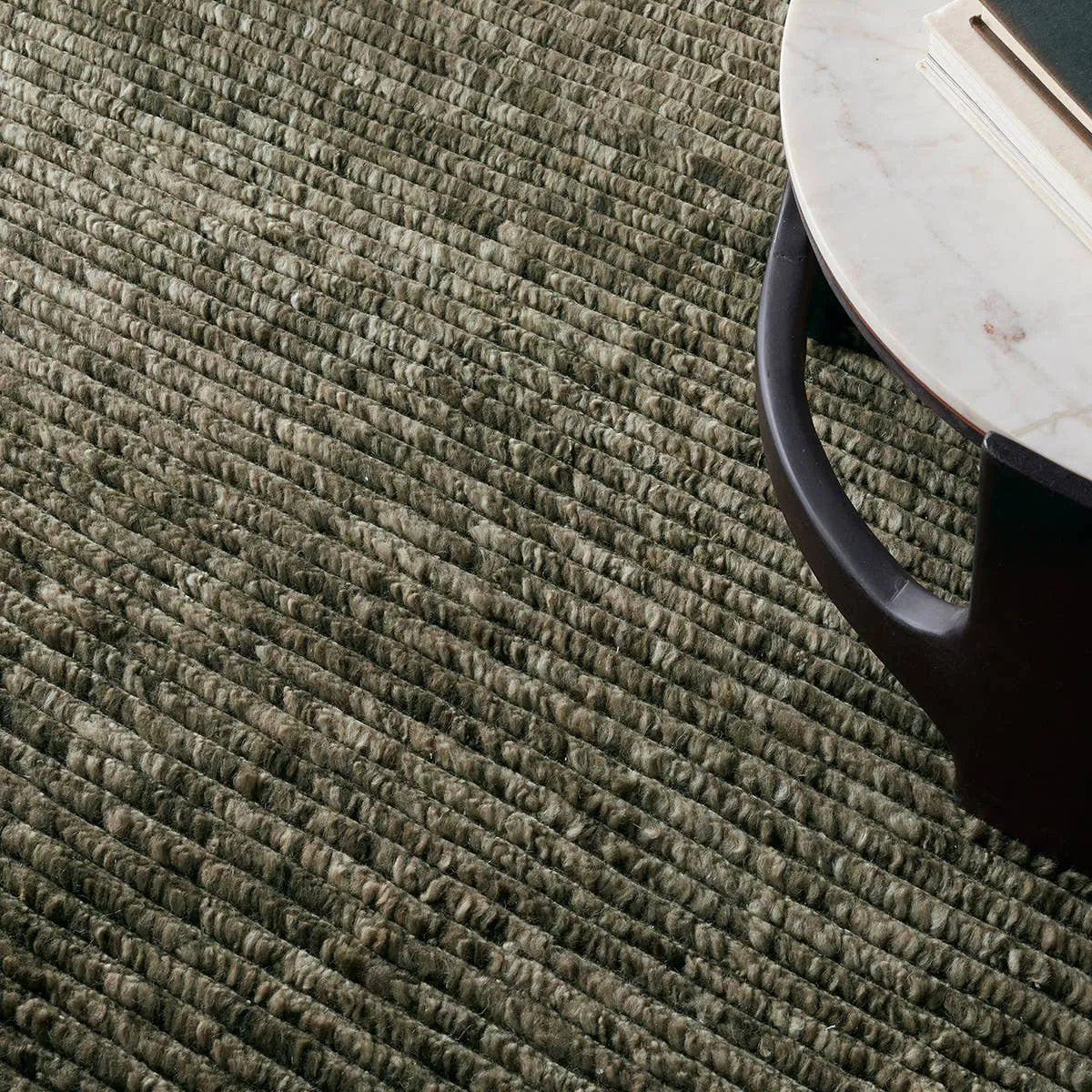 Featuring Alpine Hand-Knotted Rug by Jaipur Living at Amethyst Home. Drawing inspiration from Moroccan textiles, Alpine showcases the beauty in simplicity. Durable wool is hand-knotted onto a cotton foundation to create this high-piled accent piece. Its solid green design instantly adds warmth and comfort to any indoor, medium-traffic setting.Hand Knotted100% . Amethyst Home provides interior design, new home construction design consulting, vintage area rugs, and lighting in the Dallas metro area.