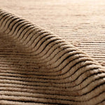 Featuring Alpine Oatmeal Hand-Knotted Rug by Jaipur Living at Amethyst Home. Drawing inspiration from Moroccan textiles, Alpine showcases the beauty in simplicity. Durable wool is hand-knotted onto a cotton foundation to create this high-piled accent piece. Its warm, solid tan design is finished with braided fringe trims for a touch of boho charm. Alpine i. Amethyst Home provides interior design, new home construction design consulting, vintage area rugs, and lighting in the Des Moines metro area.