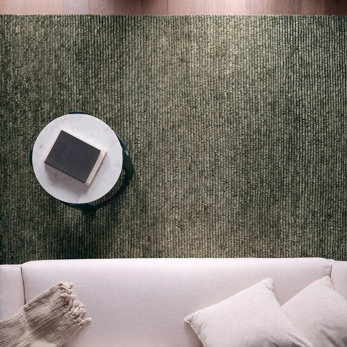 Featuring Alpine Hand-Knotted Rug by Jaipur Living at Amethyst Home. Drawing inspiration from Moroccan textiles, Alpine showcases the beauty in simplicity. Durable wool is hand-knotted onto a cotton foundation to create this high-piled accent piece. Its solid green design instantly adds warmth and comfort to any indoor, medium-traffic setting.Hand Knotted100%. Amethyst Home provides interior design, new home construction design consulting, vintage area rugs, and lighting in the Houston metro area.