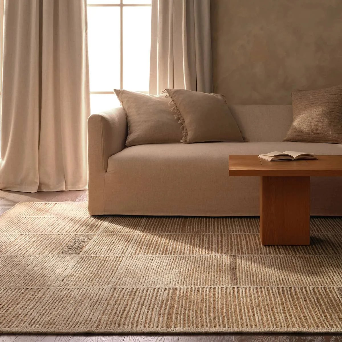 Featuring Aytana Hand-Knotted Rug by Jaipur Living at Amethyst Home. Beauty is on the horizon with the Bezem Aytana. The Aytana design features a mid-century linear pattern in tonal shades of beige for subtle visual depth. Hand-knotted from easy-care wool with a high-low pile, this piece is as practical as it is captivating—a true testament to modern craftsmans. Amethyst Home provides interior design, new home construction design consulting, vintage area rugs, and lighting in the Tampa metro area.