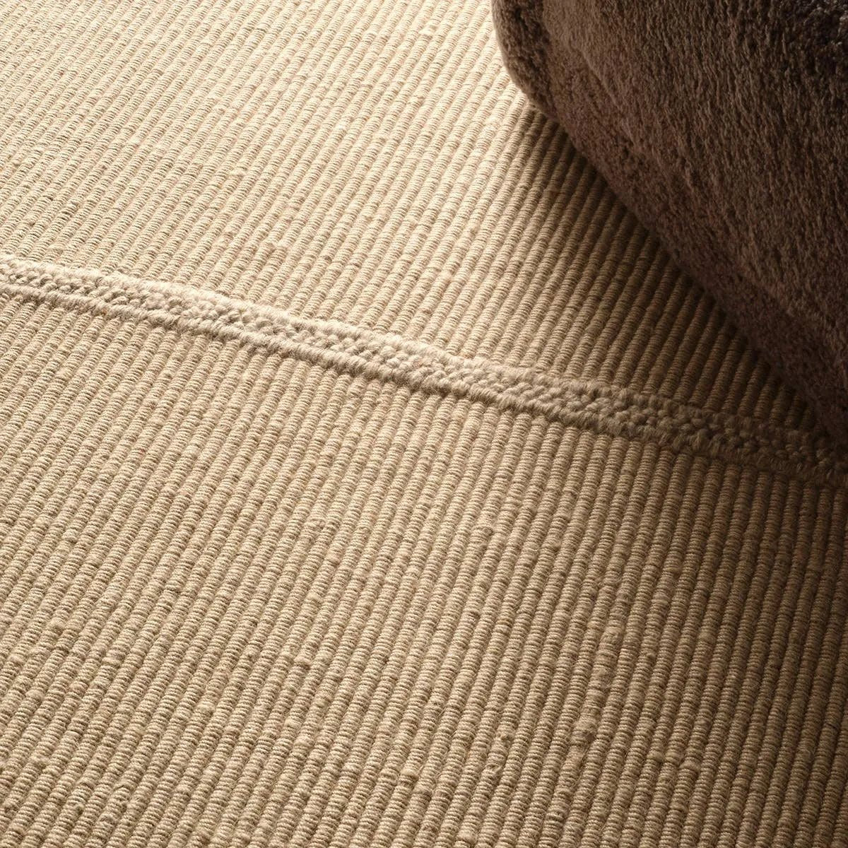 Featuring Bayana Rug by Jaipur Living at Amethyst Home. Authentic craftsmanship takes center stage with the Yatra Bayana. Handcrafted with meticulous care, this piece is sewn together in distinct channels, emulating the traditional techniques used by nomadic weavers with looms. Its solid tan shade and unique design elements create a contemporary aesthetic t. Amethyst Home provides interior design, new home construction design consulting, vintage area rugs, and lighting in the Park City metro area.