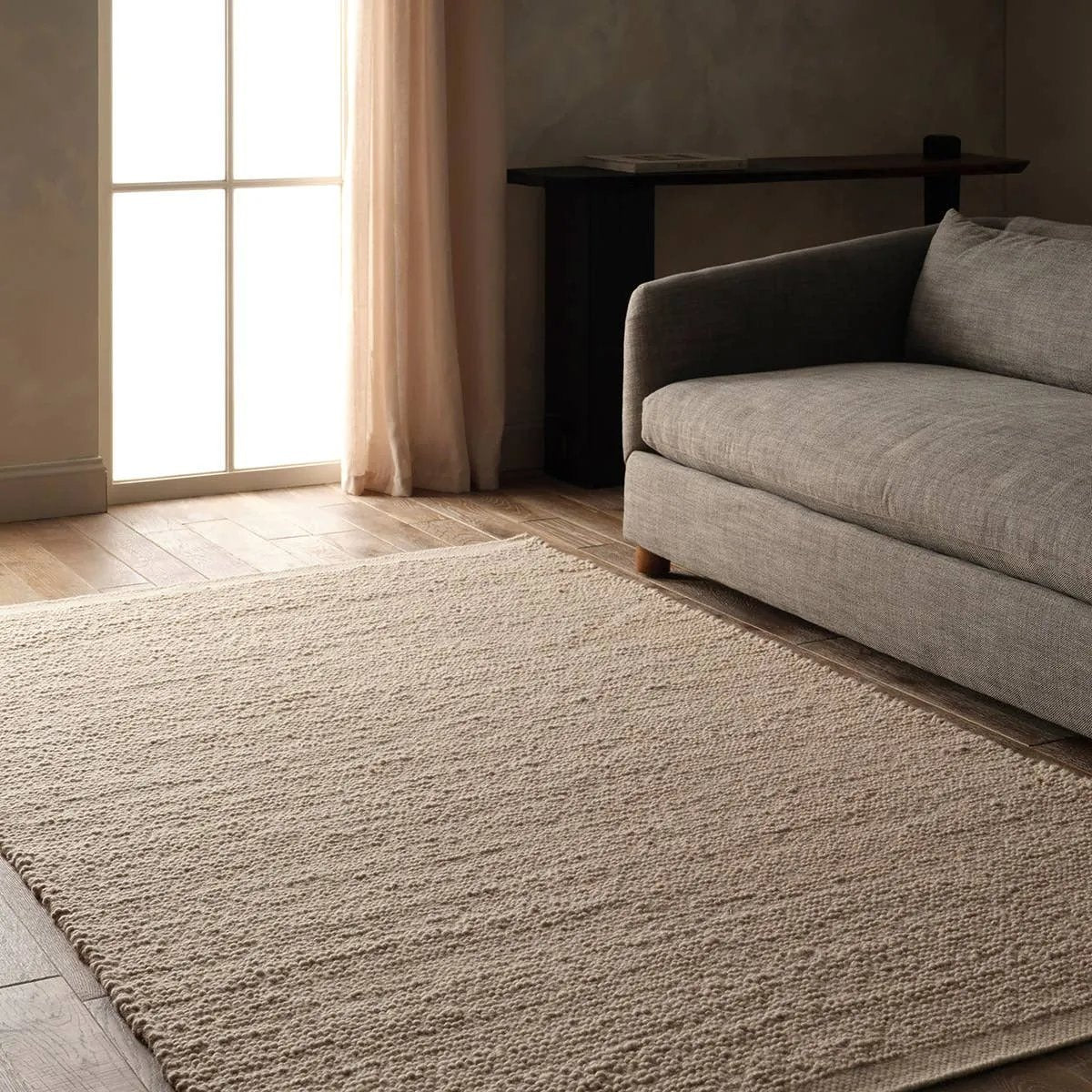 Featuring Brodie Rug by Jaipur Living at Amethyst Home. Cozy and stylish in the same moment, the hand-loomed Vestra Brodie boasts the soft and inviting texture of the shearling look with the addition of subtle, sophisticated details. With a neutral brown colorway, the Tadeo rug complements a room without detracting from its current design scheme.Handwoven65. Amethyst Home provides interior design, new home construction design consulting, vintage area rugs, and lighting in the Charlotte metro area.