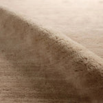 Featuring Colson Hand-Knotted Rug by Jaipur Living at Amethyst Home. The Bekarys Colson features a shaggy texture with a remarkably soft pile that invites relaxation and warmth. Its solid neutral tones provide a versatile backdrop that enhances any decor. This plush, hand-knotted gem offers both tactile pleasure and visual appeal.Hand Knotted100% WoolBKR01. Amethyst Home provides interior design, new home construction design consulting, vintage area rugs, and lighting in the Alpharetta metro area.