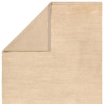 Featuring Colson Hand-Knotted Rug by Jaipur Living at Amethyst Home. The Bekarys Colson features a shaggy texture with a remarkably soft pile that invites relaxation and warmth. Its solid neutral tones provide a versatile backdrop that enhances any decor. This plush, hand-knotted gem offers both tactile pleasure and visual appeal.Hand Knotted100% WoolBKR0. Amethyst Home provides interior design, new home construction design consulting, vintage area rugs, and lighting in the Kansas City metro area.