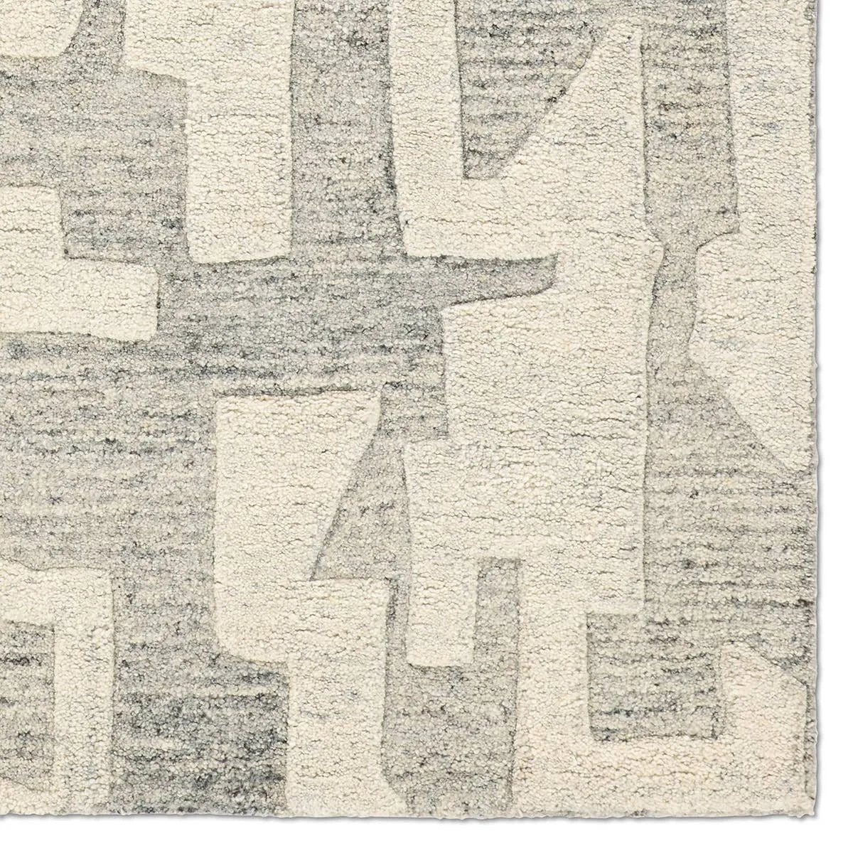 Featuring Eminence Rug by Jaipur Living at Amethyst Home. The handtufted Mallino Eminence designed by Nikki Chu infuses homes with contemporary appeal and stylishly contrasting motifs. Crafted from 100% undyed wool, the Eminence rug features a high-low texture with a soft hand and hand-embossed details. The tonal gray and ivory white geometric pattern embo. Amethyst Home provides interior design, new home construction design consulting, vintage area rugs, and lighting in the Washington metro area.