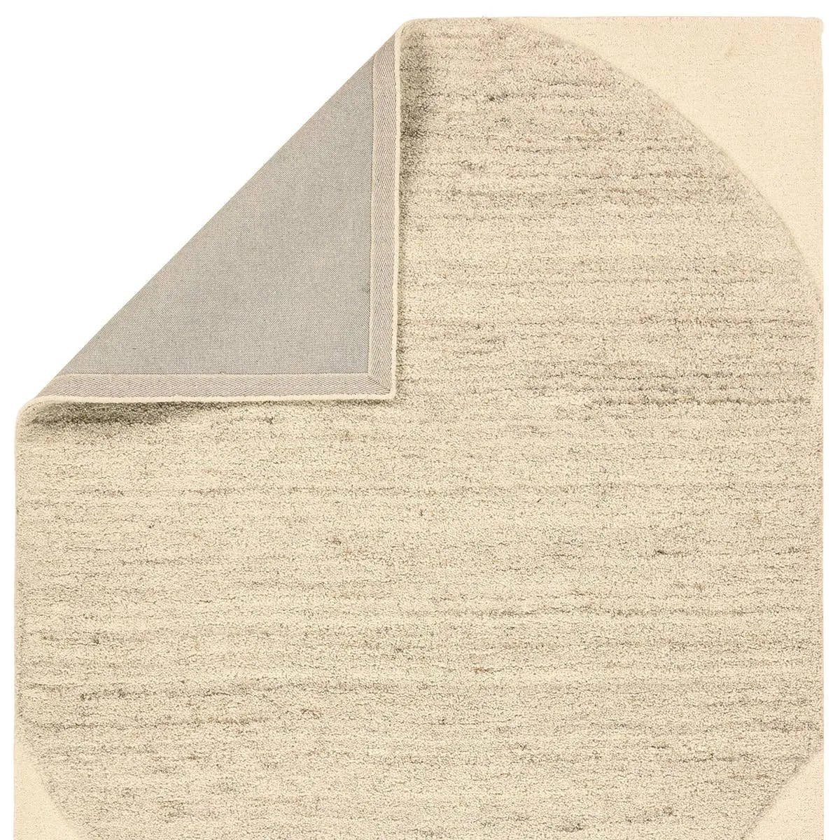 Featuring Haryana Rug by Jaipur Living at Amethyst Home. Add a contemporary flair to floors with the Reyner Haryana. Hand-tufted from 100% handspun, undyed wool, the plush rug features a high-low pile that accentuates its mid-century, Brutalist-inspired geometric pattern. Easy-to-match shades of tan and taupe to add warmth and depth to any interior.Hand Tuf. Amethyst Home provides interior design, new home construction design consulting, vintage area rugs, and lighting in the Park City metro area.