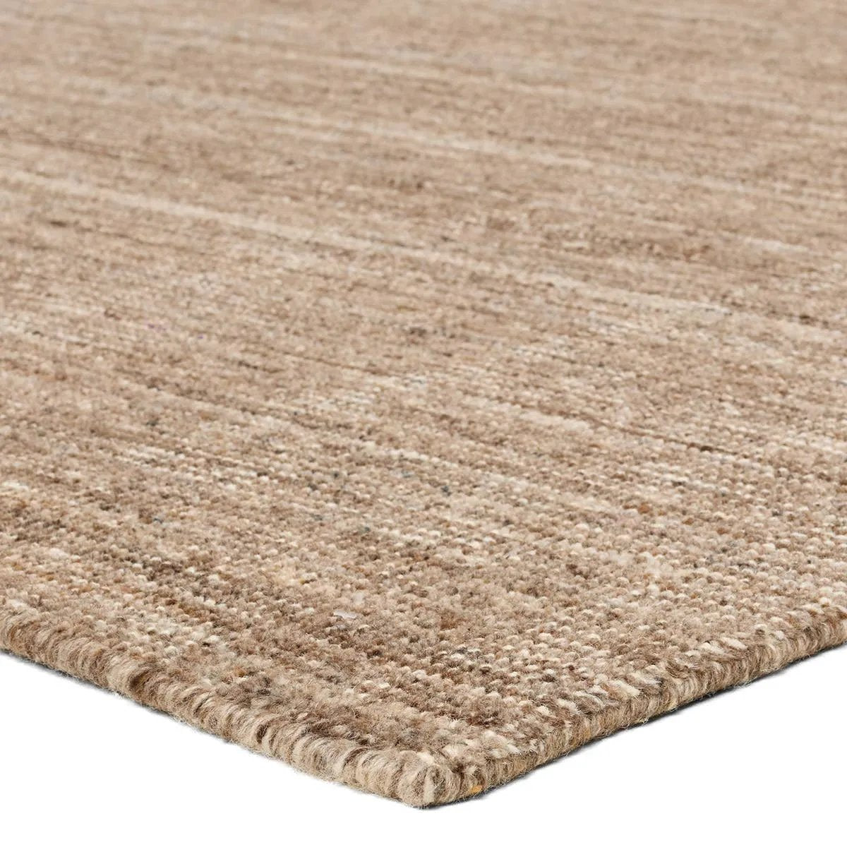 Featuring Hued Rug by Jaipur Living at Amethyst Home. Subtle variations of brown create depth and dimension in the elegantly understated Hue rug. Handwoven with precision, its solid design offers a timeless foundation for any space—from modern to classic interiors.Handwoven60% Wool 40% CottonSLO03 Solon HuedBlot stains immediately and clean with a mild soa. Amethyst Home provides interior design, new home construction design consulting, vintage area rugs, and lighting in the Washington metro area.