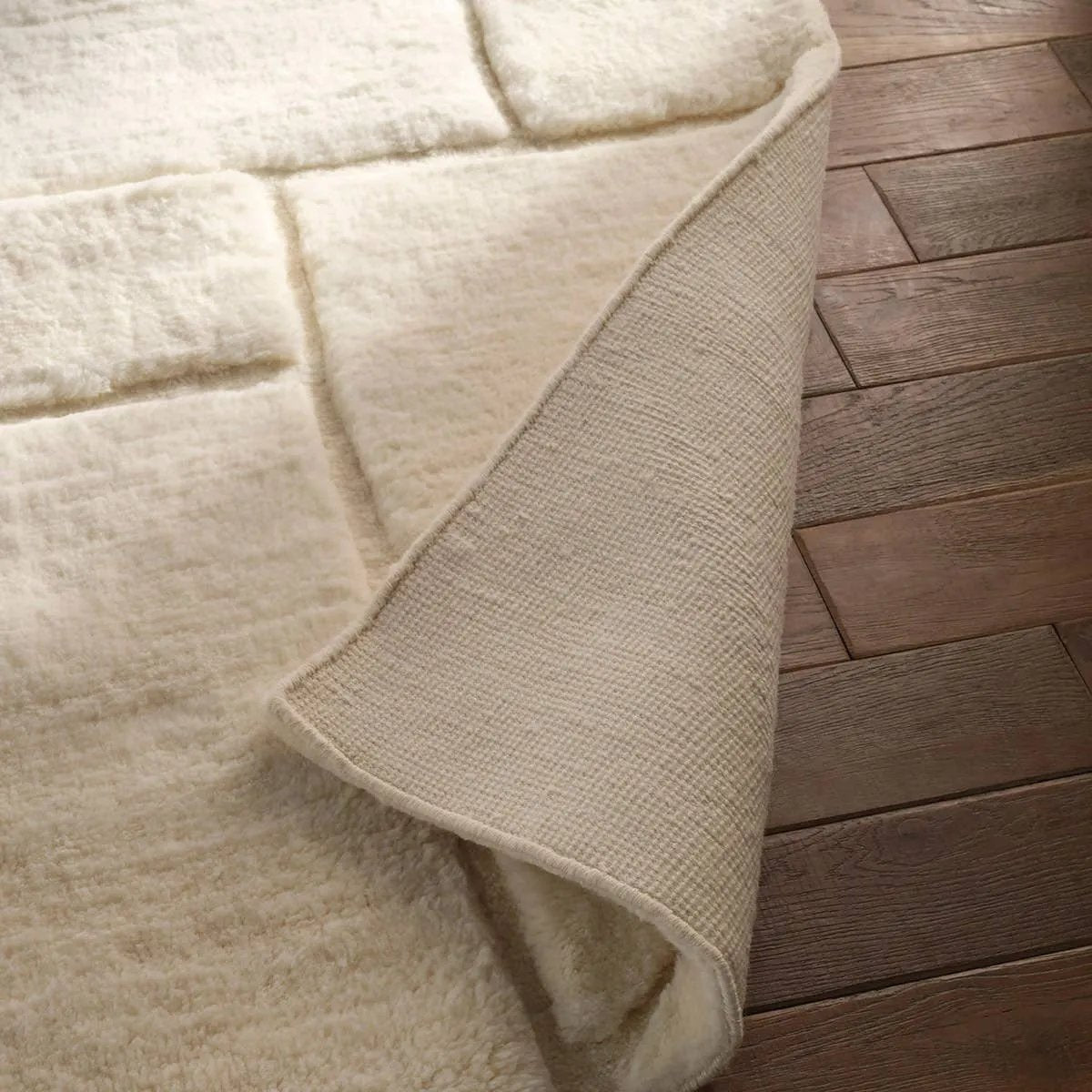 Featuring Jamun Hand-Knotted Rug by Jaipur Living at Amethyst Home. Embrace clean, simple elegance with the Ameln Jamun. As artisans knot each strand by hand, they weave in modern, centric lines that balance Moroccan heritage with contemporary edge. Made from lush New Zealand wool, the Jamun rug offers delicious dimension and a cloud-like texture, offering comf. Amethyst Home provides interior design, new home construction design consulting, vintage area rugs, and lighting in the Omaha metro area.