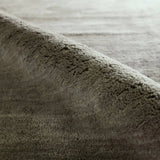 Featuring Judson Hand-Knotted Rug by Jaipur Living at Amethyst Home. The Bekarys Judson features shaggy texture with a remarkably soft pile that invites relaxation and warmth. Its solid neutral tones provide a versatile backdrop that enhances any decor. This plush, hand-knotted gem offers both tactile pleasure and visual appeal.Hand Knotted100% WoolBKR04 . Amethyst Home provides interior design, new home construction design consulting, vintage area rugs, and lighting in the Los Angeles metro area.