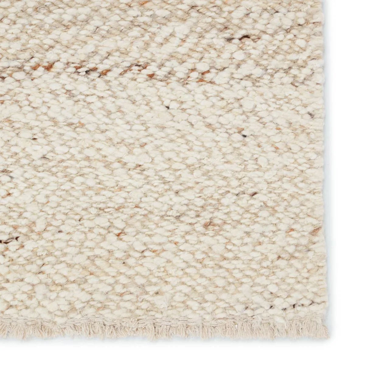 Featuring Leona  Klarna Rug by Jaipur Living at Amethyst Home. The texture-rich Leona Klarna offers an assortment of updated kilim looks, re-invented with the on-trend shearling style and neutral, modern palettes. The handwoven Klarna rug features a globally inspired, light brown, stripe pattern on a neutral cream base. This 100% wool accent piece delights . Amethyst Home provides interior design, new home construction design consulting, vintage area rugs, and lighting in the San Diego metro area.
