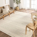 Featuring Leona Rya Rug by Jaipur Living at Amethyst Home. The texture-rich Leona Rya offers an assortment of updated kilim looks, re-invented with the on-trend shearling style and neutral, modern palettes. The handwoven Rya rug features a cream base with taupe stripes. This 100% wool accent piece delights in high and low traffic spaces such as bedrooms, li. Amethyst Home provides interior design, new home construction design consulting, vintage area rugs, and lighting in the Park City metro area.