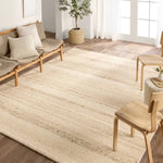 Featuring Leona Sollus Rug by Jaipur Living at Amethyst Home. The texture-rich Leona Sollus offers an assortment of updated kilim looks, re-invented with the on-trend shearling style and neutral, modern palettes. The handwoven Sollus rug features a tan base with brown and beige stripes. This 100% wool accent piece delights in high and low traffic spaces su. Amethyst Home provides interior design, new home construction design consulting, vintage area rugs, and lighting in the Scottsdale metro area.