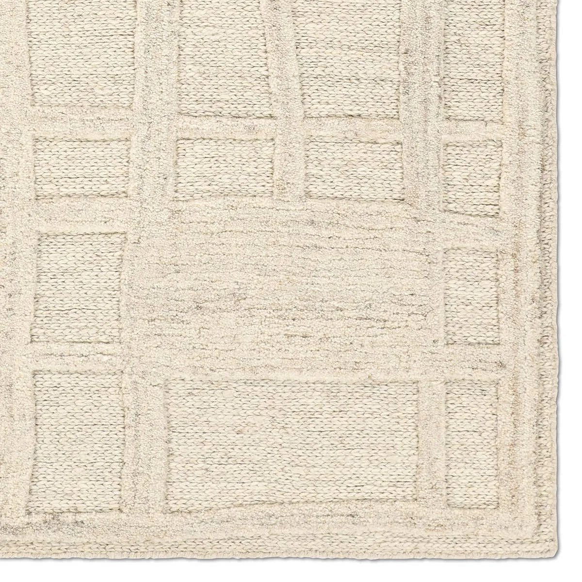 Featuring Lustrous Rug by Jaipur Living at Amethyst Home. The Lustrous design features flowing waves of 100% premium undyed wool in soft cream tones. Its high-low texture creates movement, adding an earthy, elemental ease to any modern space. Crafted with care to mimic a soumak weave, this rug offers timeless elegance and a soft, tactile feel.Hand Tufted100% W. Amethyst Home provides interior design, new home construction design consulting, vintage area rugs, and lighting in the Boston metro area.