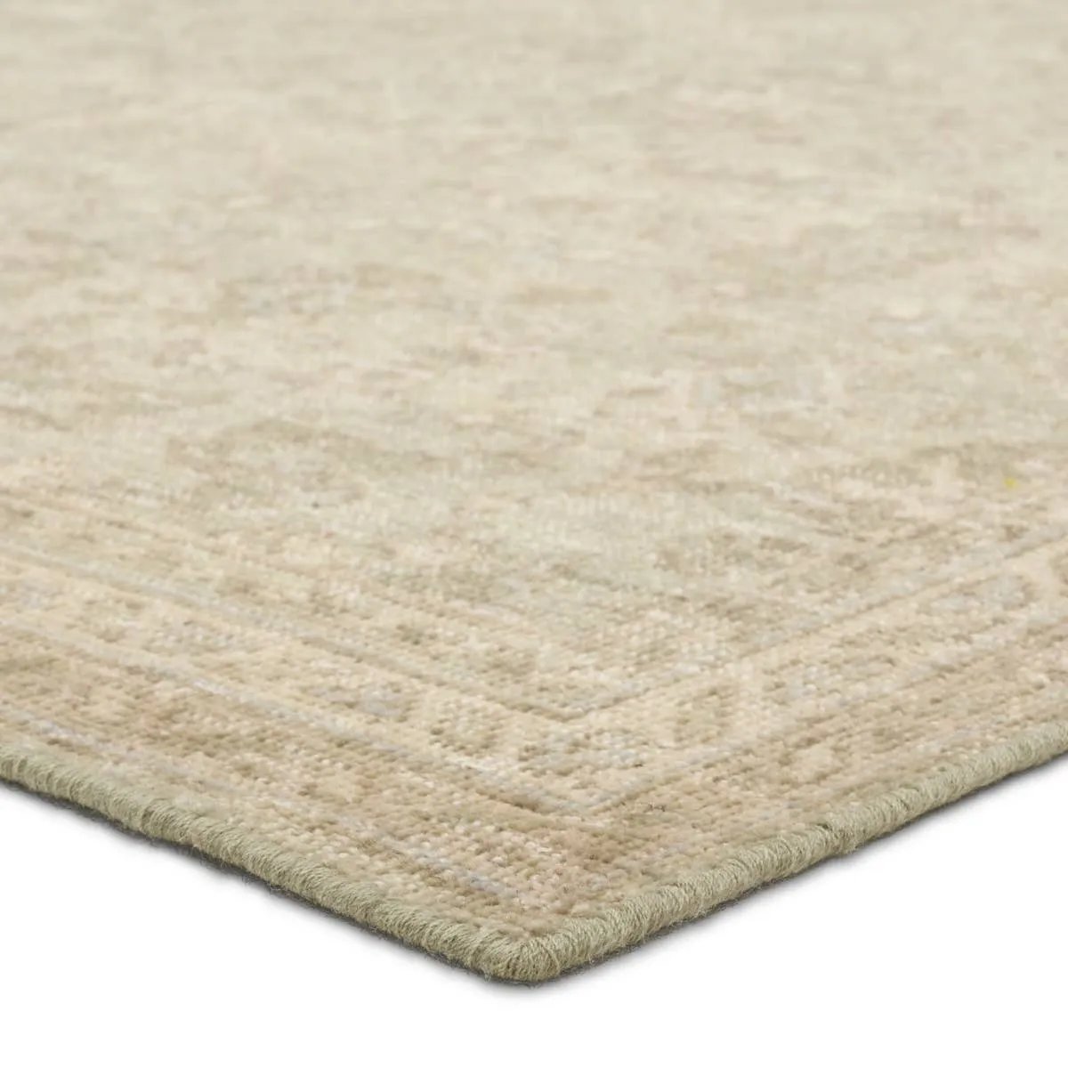 Featuring Onessa Delwyn Hand-Knotted Rug by Jaipur Living at Amethyst Home. The Onessa Delwyn marries traditional motifs with soft, subdued colorways for the perfect blend of fresh and time-honored style. These hand-knotted wool rugs feature hand-sheared quality with a coveted vintage look. The Delwyn rug features subtle floral patterns in shades of cre. Amethyst Home provides interior design, new home construction design consulting, vintage area rugs, and lighting in the Winter Garden metro area.