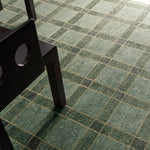 Featuring Quinlan Hand-Knotted Rug by Jaipur Living at Amethyst Home. The Quinlan design reinvents timeless geometric grid patterns, fusing classic charm with a modern edge. Its beautiful blue hue elevates any mid-century modern space, while the 100% wool construction offers natural stain resistance. Stylish and durable, this piece is designed to stand the te. Amethyst Home provides interior design, new home construction design consulting, vintage area rugs, and lighting in the Houston metro area.