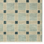 Featuring Quinlan Hand-Knotted Rug by Jaipur Living at Amethyst Home. The Quinlan design reinvents timeless geometric patterns, fusing classic charm with a modern edge. Soft beige tones, punctuated by a blue accent, elevate any mid-century modern space. Handcrafted from naturally stain-resistant wool, this rug handles medium-traffic areas, kids, and pets . Amethyst Home provides interior design, new home construction design consulting, vintage area rugs, and lighting in the Los Angeles metro area.