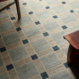 Featuring Quinlan Hand-Knotted Rug by Jaipur Living at Amethyst Home. The Quinlan design reinvents timeless geometric patterns, fusing classic charm with a modern edge. Soft beige tones, punctuated by a blue accent, elevate any mid-century modern space. Handcrafted from naturally stain-resistant wool, this rug handles medium-traffic areas, kids, and pet. Amethyst Home provides interior design, new home construction design consulting, vintage area rugs, and lighting in the Newport Beach metro area.