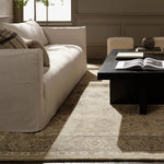 Featuring Rhan Hand-Knotted Rug by Jaipur Living at Amethyst Home. Where durability, style, and comfort come together, the Rhan rug's intricate design and sandy tones seamlessly settle into any space. This artisan-made rug is hand knotted, hand-carded, and handspun in India. It's soft to the touch and doesn't stain easily, so you can live more and worry les. Amethyst Home provides interior design, new home construction design consulting, vintage area rugs, and lighting in the Charlotte metro area.