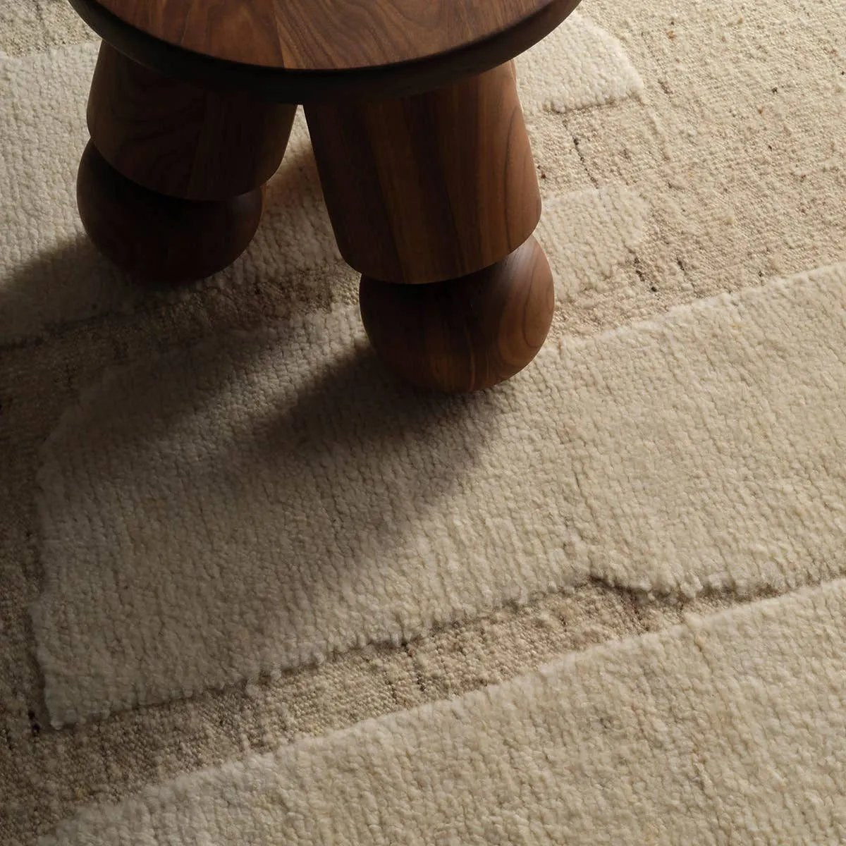 Featuring Riya Hand-Knotted Rug by Jaipur Living at Amethyst Home. The Lasden Riya redefines contemporary style with large-scale geometric patterns hand-knotted on plush wool. The Riya design offers an inviting softness underfoot, while pleasing the eyes with its neutral tones and visual interest. A textured high-low effect brings the Brutalist pattern to life,. Amethyst Home provides interior design, new home construction design consulting, vintage area rugs, and lighting in the Omaha metro area.