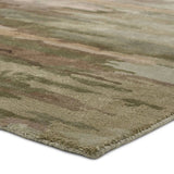 Featuring Ryenn Rug by Jaipur Living at Amethyst Home. Infused with a whimsical spirit and sophisticated flair, the Genesis Ryenn brings an artistic edge to any contemporary home. The Ryenn design features an abstract, grounding green and brown pattern, enhanced with a lustrous sheen reminiscent of shimmering water reflections.Hand Tufted60% Wool 40% Viscose. Amethyst Home provides interior design, new home construction design consulting, vintage area rugs, and lighting in the Portland metro area.