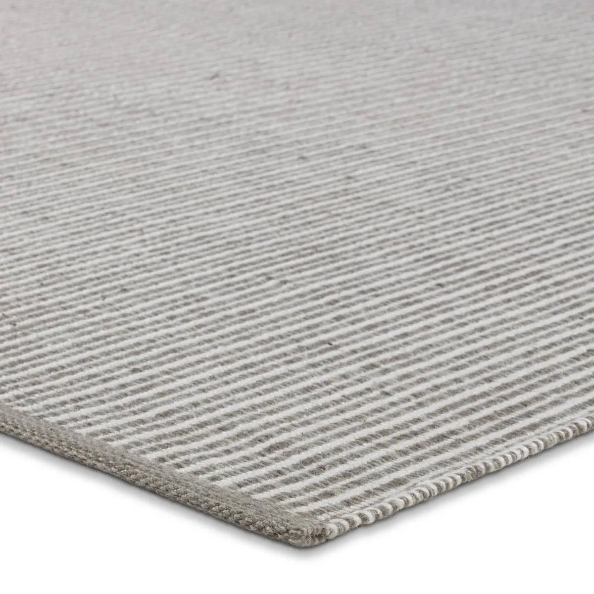 Featuring Sacdecer Avore Rug by Jaipur Living at Amethyst Home. The Sacdecer Avore is an exceptional handwoven indoor/outdoor rug, blending high-performance style with eco-conscious materials. Hand crafted in India from 100% PET yarn, sourced from recycled plastic bottles, it's both durable and environmentally friendly. Designed to withstand outdoor elements a. Amethyst Home provides interior design, new home construction design consulting, vintage area rugs, and lighting in the Boston metro area.
