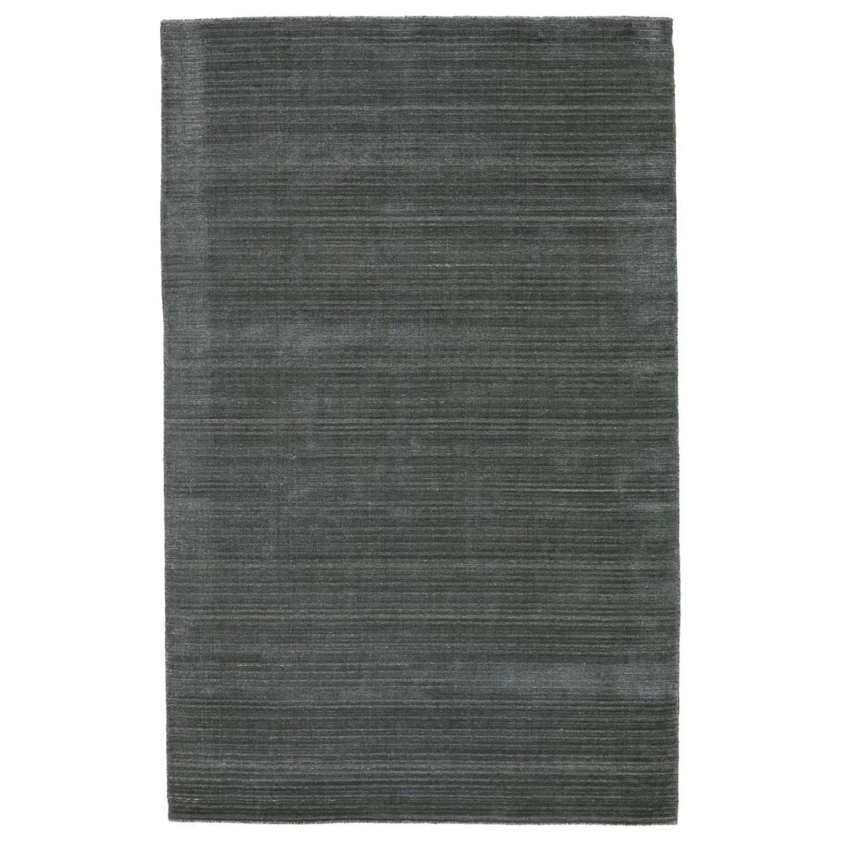 Featuring Second Sunset  Gradient Rug by Jaipur Living at Amethyst Home. The easy-to-decorate, earthy tones of the Second Sunset Gradient prove that simplicity can sometimes be striking. The Gradient rug is hand loomed of durable wool and jasmine for a sumptuous and inviting hand. The variation in the blue-gray tones of this lustrous rug creates stunning de. Amethyst Home provides interior design, new home construction design consulting, vintage area rugs, and lighting in the Charlotte metro area.